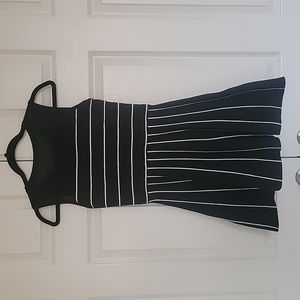 Black and white knitted dress, size S, above the knee.